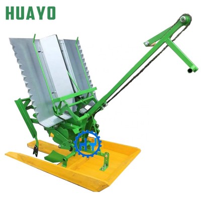 Manual paddy rice seedling transplanter