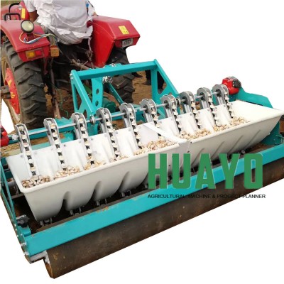 Tractor driven garlic planter machinery